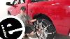 Installing The Titan Chain Mud Service Snow Chains For Wide Base Tires On Your 2022 Ram 1500 Classic
